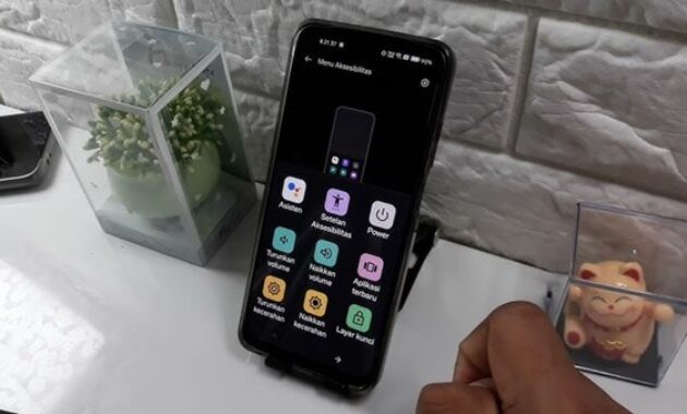 Gambar 2. Gunakan kombinasi tombol volume + home